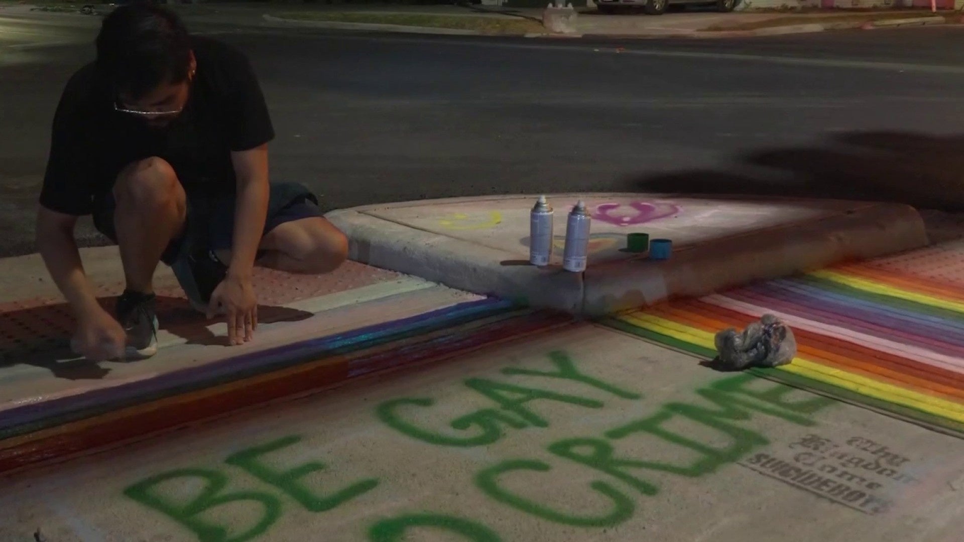 Protestors use chalk, paint to cover sidewalks with rainbows after crosswalk removed in Montrose