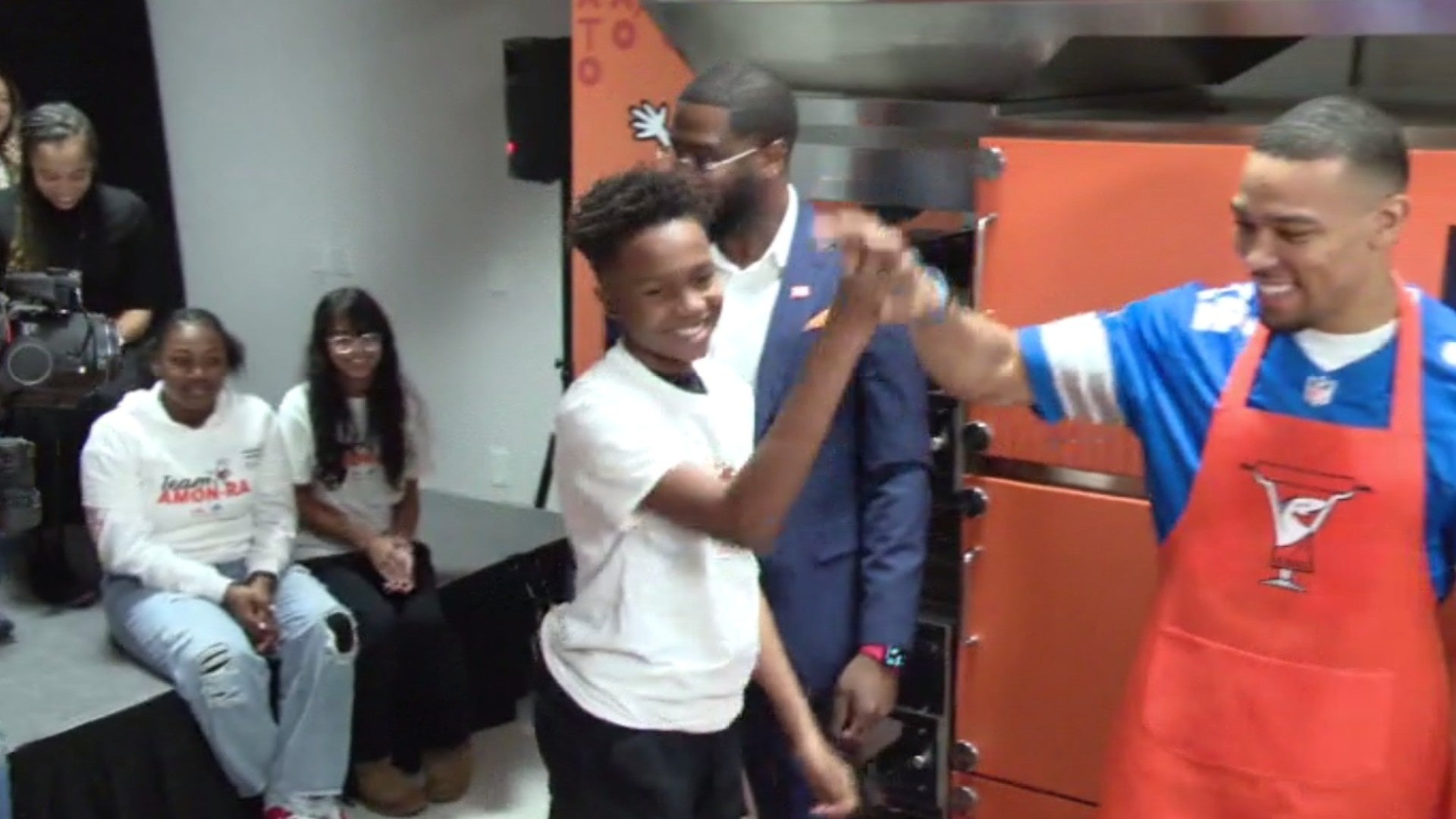 Detroit Lions star Amon-Ra St. Brown joins Little Caesars for pizza-making event with Detroit students
