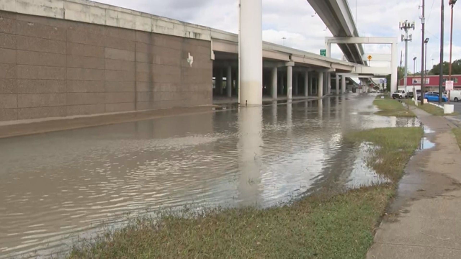 Water main break causing flooding along Southwest Freeway at Westpark Drive